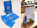 Load image into Gallery viewer, Blue A5 stand-up display with QR codes and 'Clarity' branding on a white background.